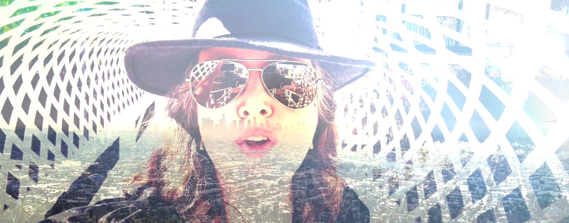 A montage from the Don't Get Too Close To The Fire Burn Burn Burn music video with an overlay of Anne-Lise standing on a Venice Canal bridge with the city of Los Angeles in the background.